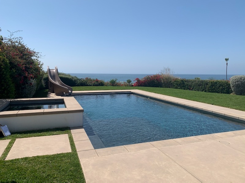 Pool with a view of the ocean.